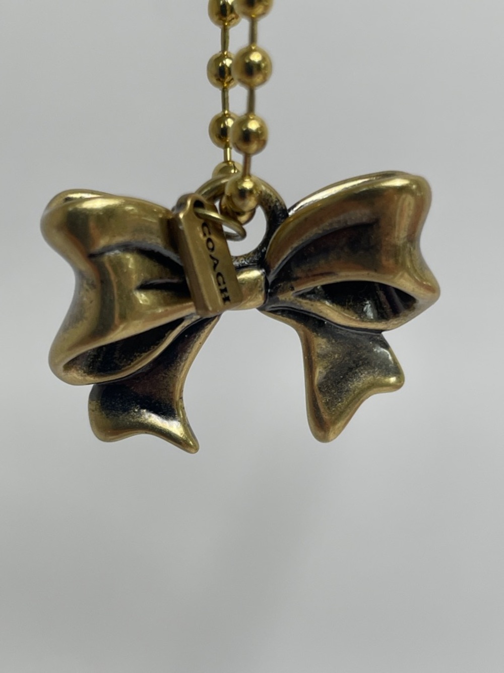 NWT Coach New York Exclusive Bow Charm
